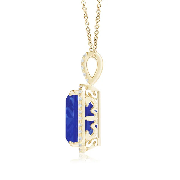 Emerald-cut tanzanite pendant in 14K gold with diamond halo and 18-inch chain by Irdoja Diamonds.
