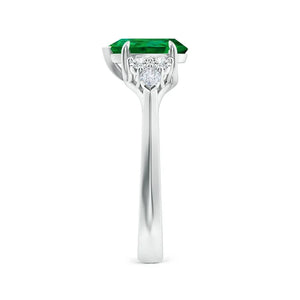 Lab-grown emerald three-stone engagement ring in 18K white gold by Irdoja Diamonds.