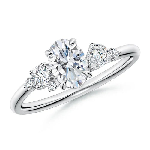 Claw prong oval lab-grown diamond engagement ring in 18k white gold with multi-shape diamond accents.
