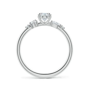 Claw prong oval lab-grown diamond engagement ring with multi-shape accents in 18k white gold.