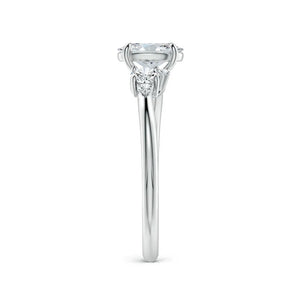 Oval lab-grown diamond ring with pear and round accents in 14K white gold by Irdoja Diamonds.