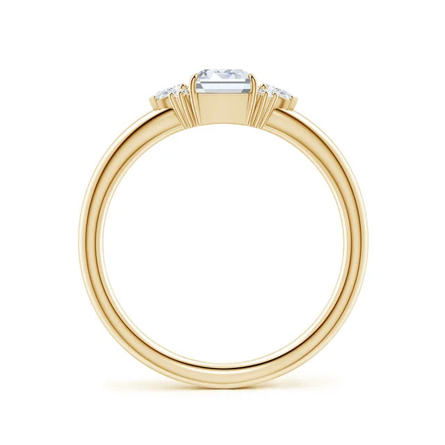 Four-claw prong emerald-cut lab-grown diamond engagement ring with marquise accent stones in 18k yellow gold by Irdoja Diamo