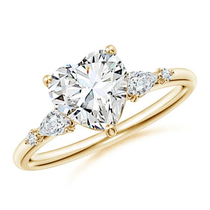 Heart-shaped lab-grown diamond engagement ring with prong settings and side stone accents in yellow gold by Irdoja Diamonds.