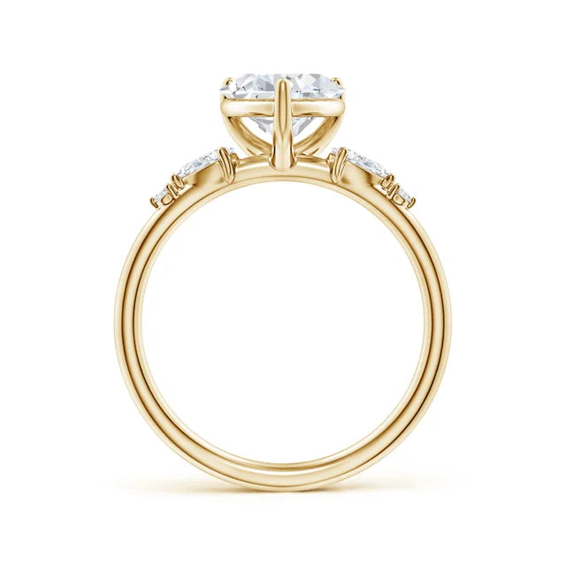 Heart-shaped lab-grown diamond engagement ring with prong settings and side stone accents in yellow gold by Irdoja Diamonds.