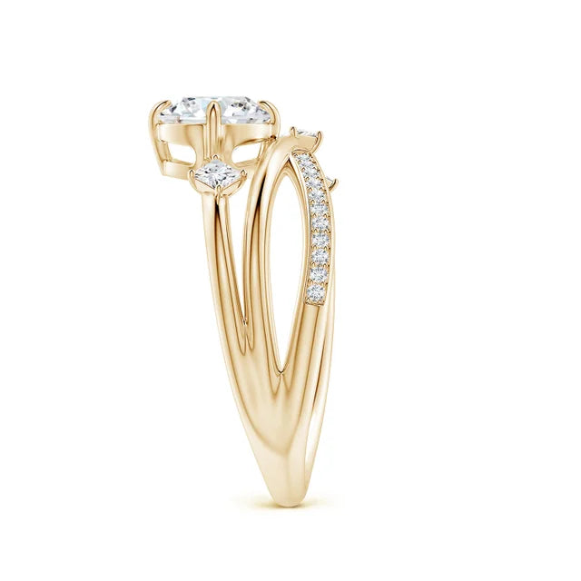 Round lab-grown diamond crossover engagement ring in 14k yellow gold with scattered accent diamonds.