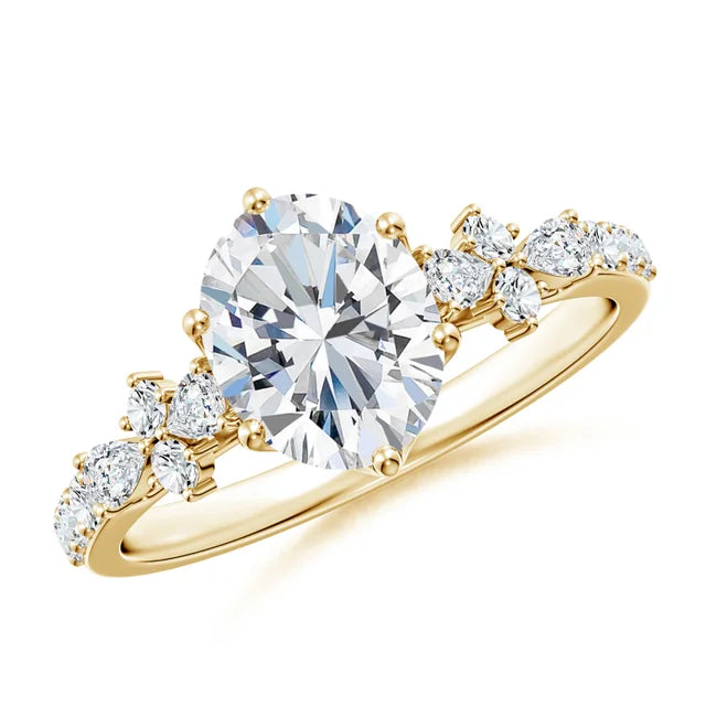 Lab-grown oval diamond engagement ring with side stone accents in yellow gold by Irdoja Diamonds.