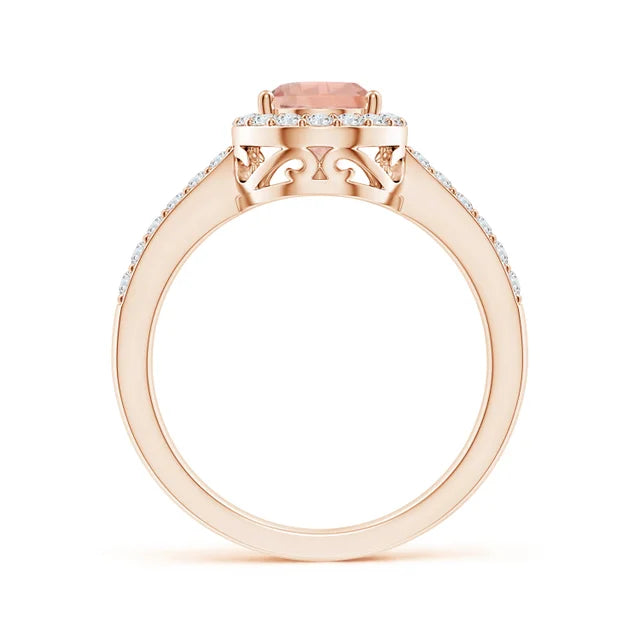 Prong-set pear morganite ring with diamond halo in rose gold by Irdoja Diamonds.