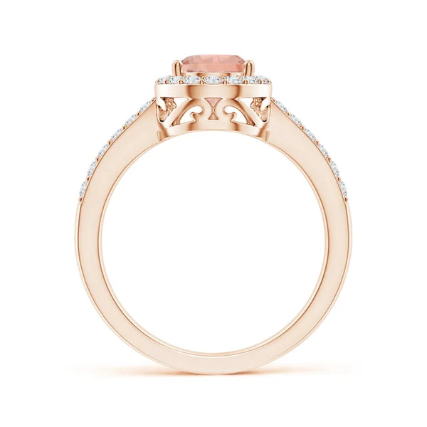 Prong-set pear morganite ring with diamond halo in rose gold by Irdoja Diamonds.