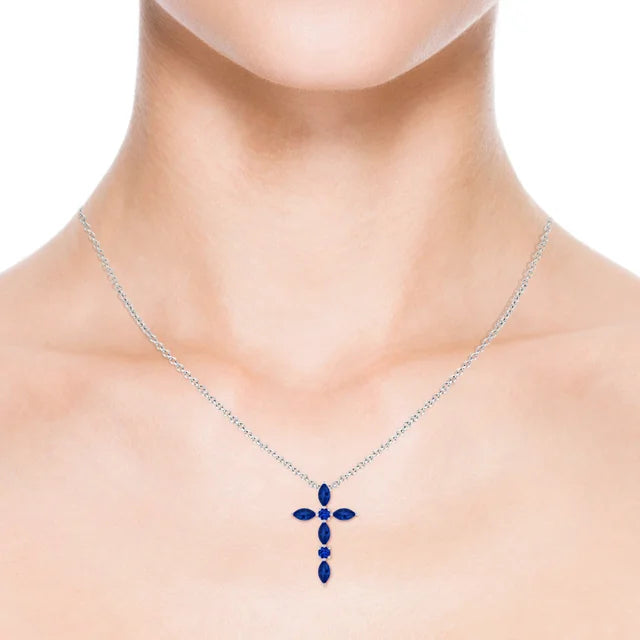 Marquise and round blue sapphire cross pendant in 14k yellow gold by Irdoja Diamonds