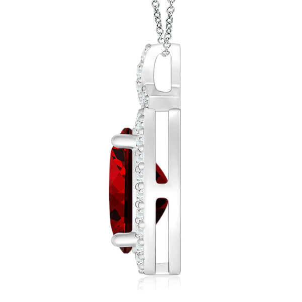 Lab-grown ruby pendant with 3.6ct oval stone, diamond halo, and 14K white gold setting by Irdoja Diamonds.
