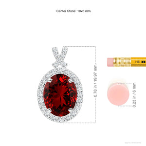 Lab-grown ruby pendant 3.6ct with diamond halo in 14K rose gold and 18K yellow gold accents.
