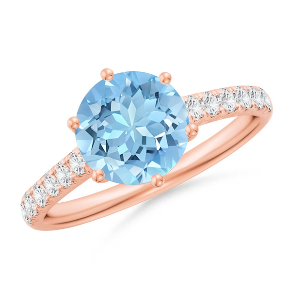 Aquamarine solitaire engagement ring with diamond accents in 18k rose gold by Irdoja Diamonds.