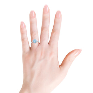 Natural aquamarine solitaire engagement ring with diamond accents in 14K or 18K gold by Irdoja Diamonds
