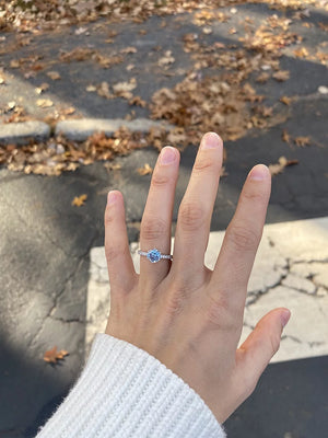 Natural aquamarine solitaire engagement ring with diamond accents in 14K or 18K gold by Irdoja Diamonds.