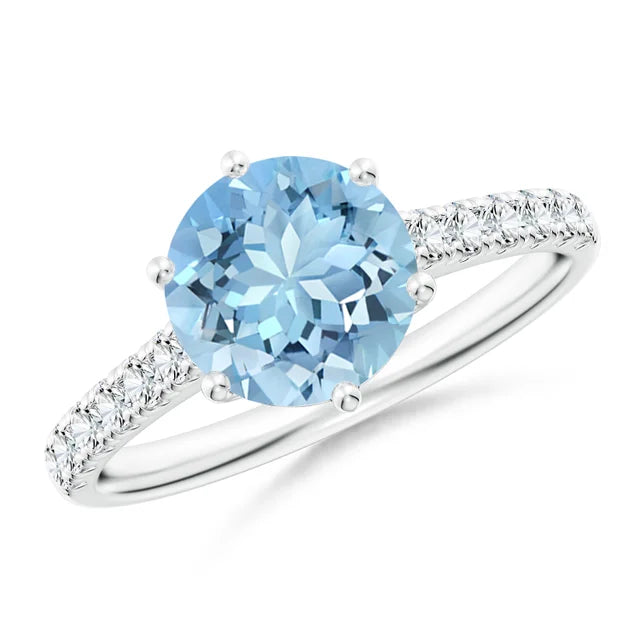 Aquamarine solitaire engagement ring with diamond accents in 18k white gold by Irdoja Diamonds.