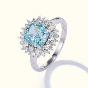 3.00ct Fancy Intense Blue lab-grown diamond cushion halo ring in 18K white gold