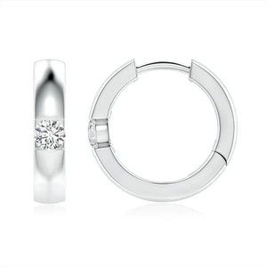 Channel-set round diamond huggie hoop earrings in 18K white gold by Irdoja Diamonds.
