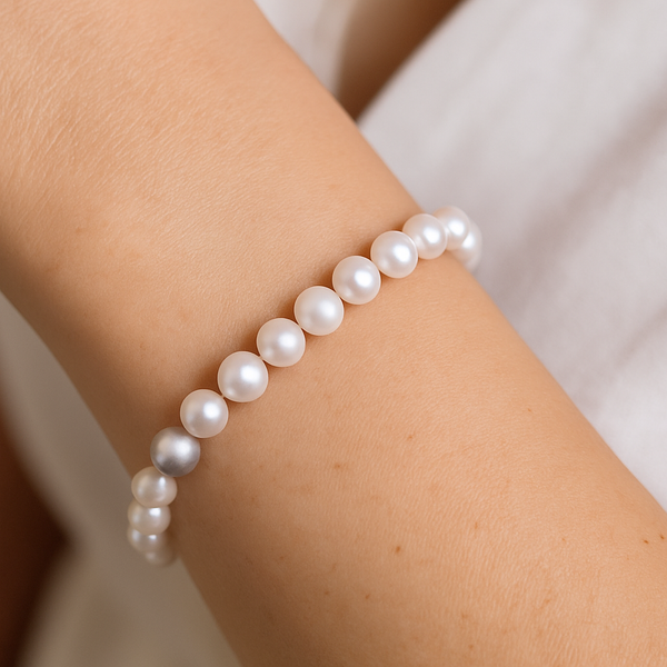 Classic Japanese Akoya Pearl Single Strand Bracelet (14K White Gold) worn on wrist, showcasing lustrous pearls.