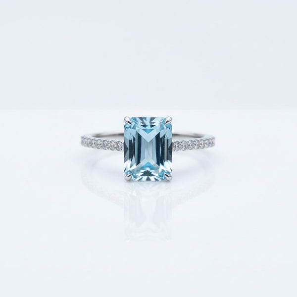 Emerald-Cut Aquamarine Ring with Diamond Band showcasing icy-blue clarity and elegant design.