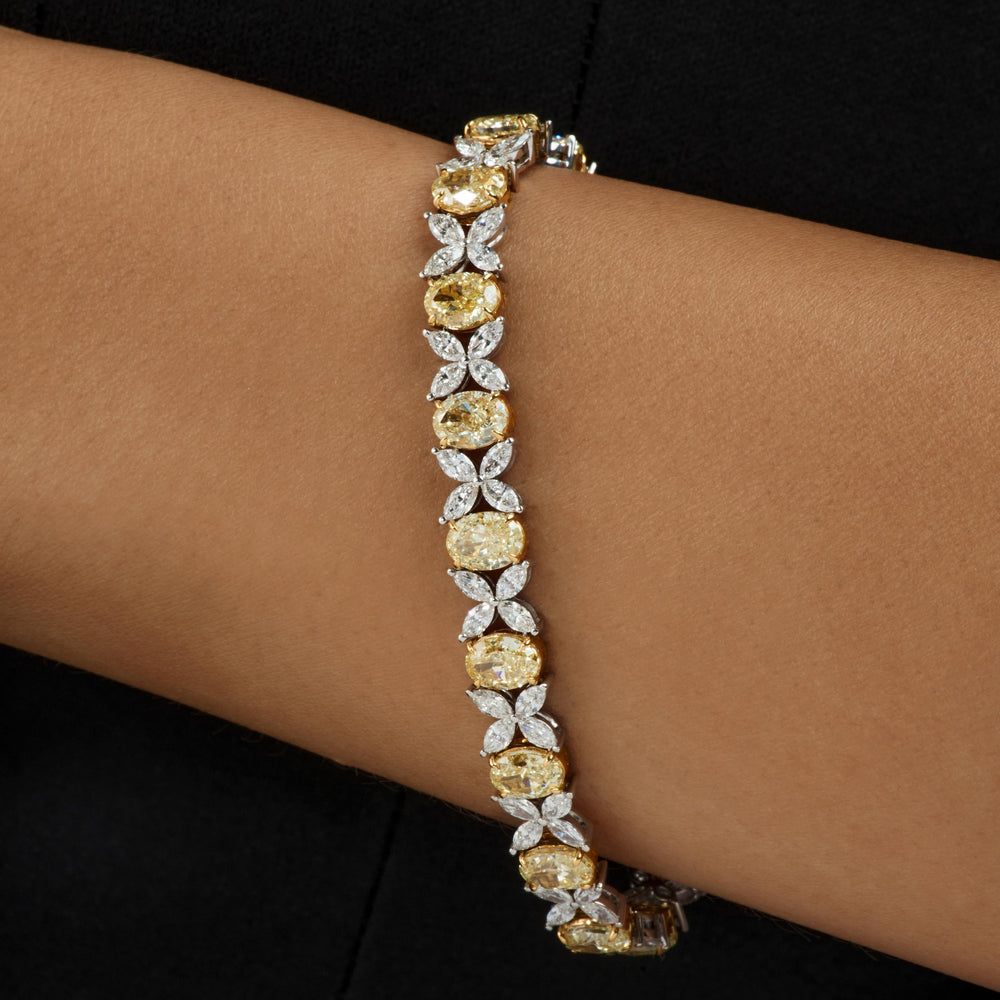 Fancy Yellow & White Lab Diamond Bracelet in 18K gold featuring oval-cut yellow and marquise-cut white diamonds.