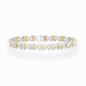 Fancy Yellow & White Lab Diamond Bracelet in 18K gold featuring oval-cut yellow and marquise-cut white diamonds.