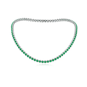 Hexagon Emerald Tennis Necklace - 14K/18K Gold Bezel Set featuring vibrant green emeralds in hexagonal bezel settings.