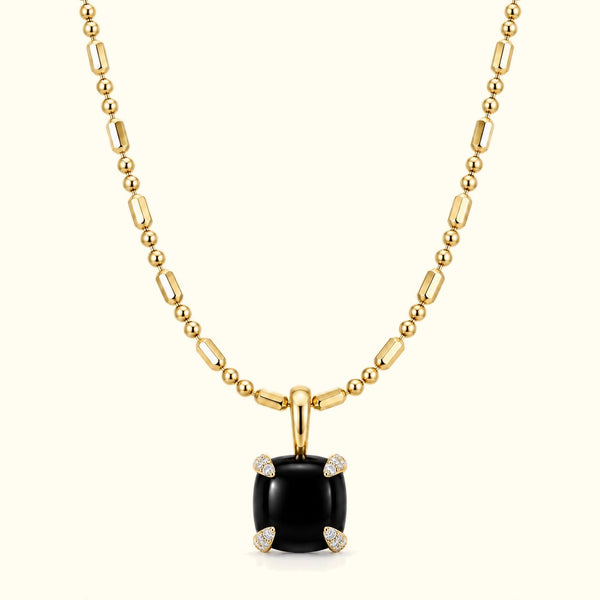 Bloom amulet necklace, a black onyx pendant on a 14K yellow gold ball-and-bar chain
