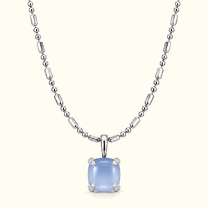 Bloom amulet necklace, a blue chalcedony pendant on a 14K white gold ball-and-bar chain