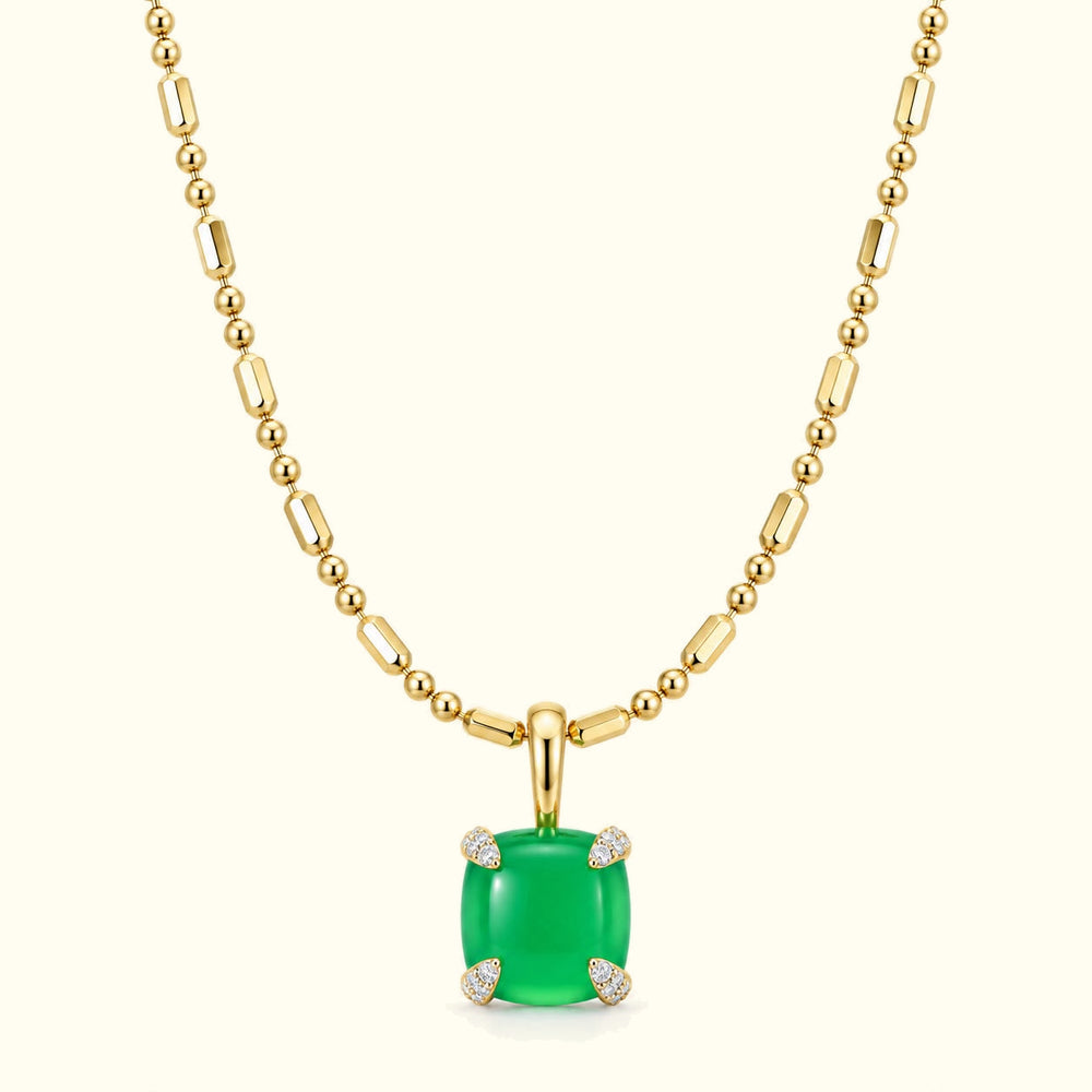 Bloom amulet necklace, a green jade pendant on a 14K yellow gold ball-and-bar chain