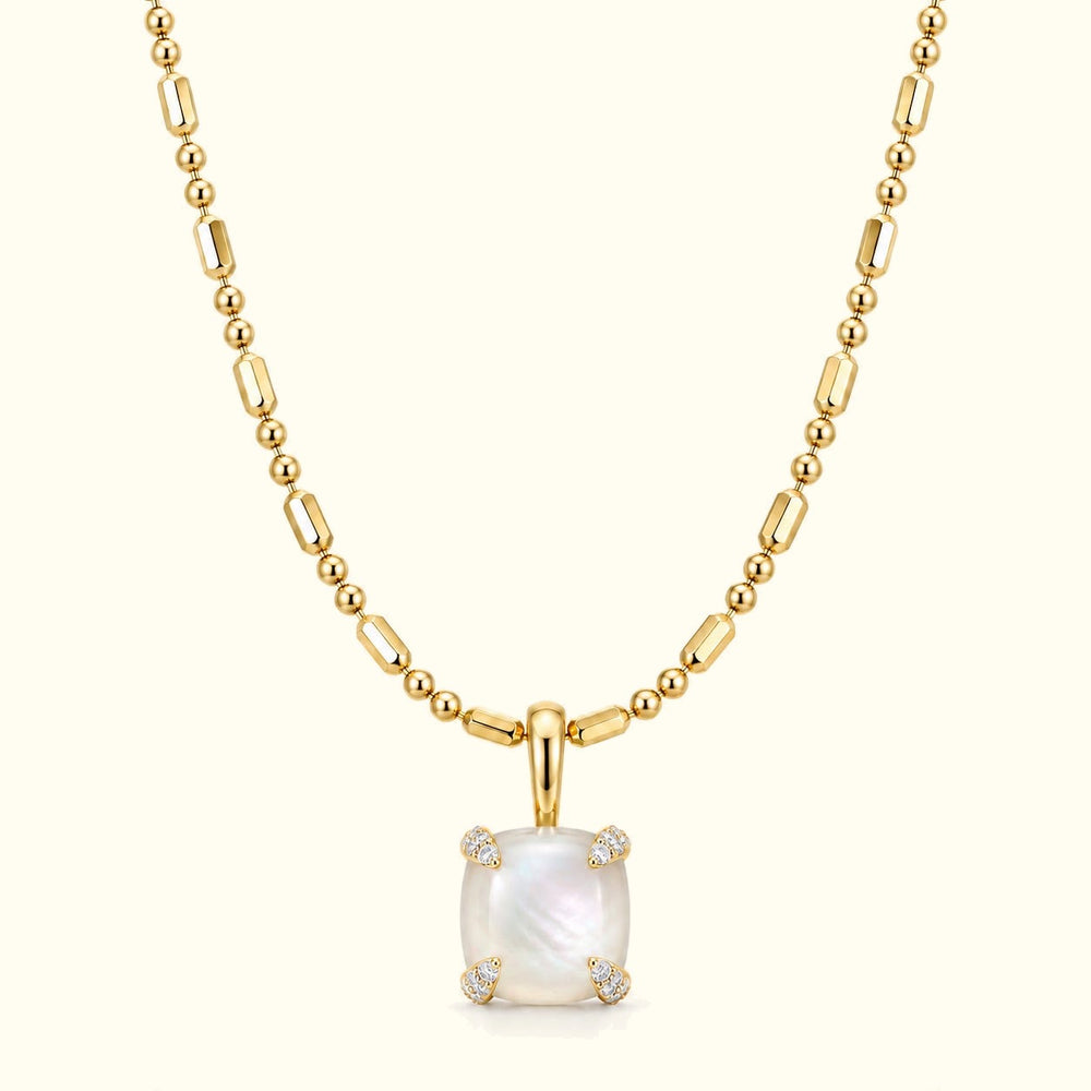 Bloom amulet necklace, a mother-of-pearl pendant on a 14K yellow gold ball-and-bar chain
