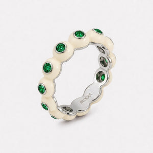 Irdoja Bubble eternity band in Ivory Cream enamel, platinum, with bezel-set emeralds.