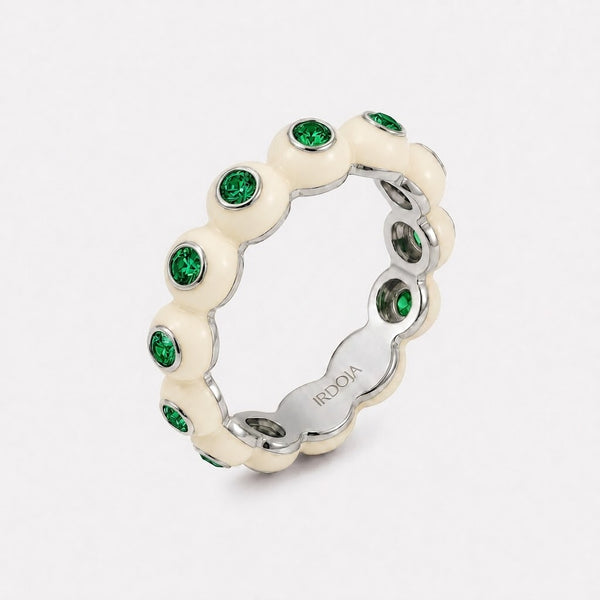 Irdoja Bubble eternity band in Ivory Cream enamel, platinum, with bezel-set emeralds.