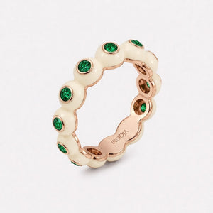 Irdoja Bubble eternity band in Ivory Cream enamel, rose gold, with bezel-set emeralds.