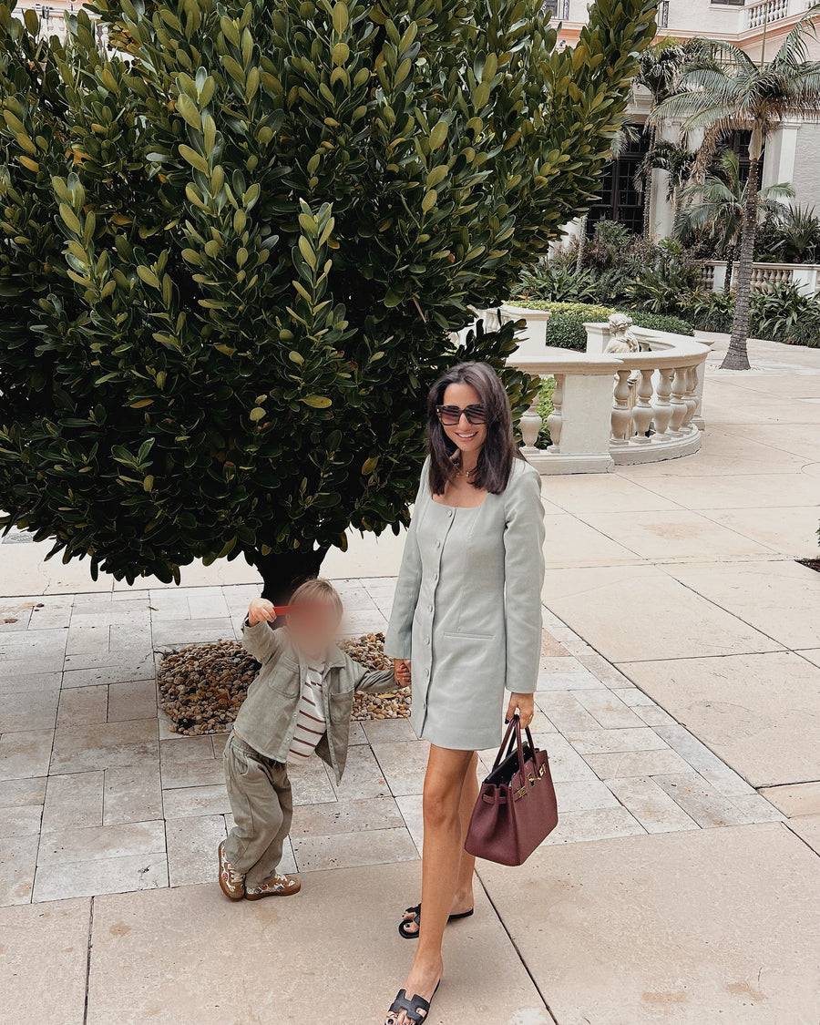 Margo Irdoja walking with her young son in Palm Beach