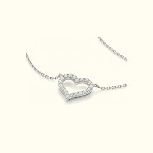 Mon Amour necklace, the open heart seen from the side on its cable chain