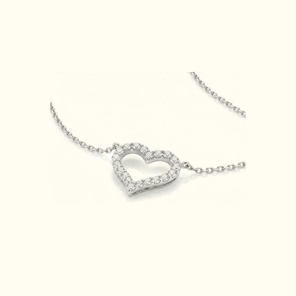 Mon Amour necklace, the open heart seen from the side on its cable chain
