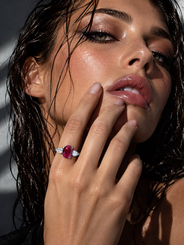 The Rose Tourmaline Ring worn, oval pink tourmaline three-stone in platinum