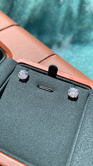 Lab-grown diamond stud earrings in 18k white gold setting, featuring a sparkling design.