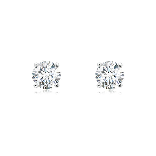 Lab-Grown Diamond Stud Earrings featuring round brilliant diamonds in a classic four-prong setting.