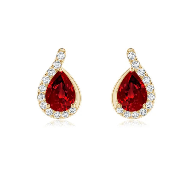 Lab-Grown Pear Ruby Earrings with Diamond Swirl Frame showcasing pear-shaped rubies and diamond detailing.