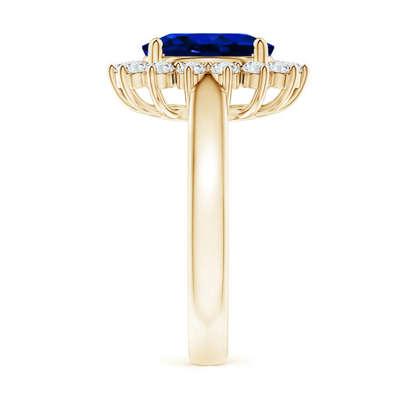 Lab-Grown Princess Diana Inspired Blue Sapphire Ring with Diamond Halo shown from the side, highlighting the oval blue sapphire.