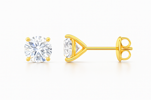 Lab-grown diamond stud earrings in yellow gold martini setting, showcasing brilliant round diamonds.