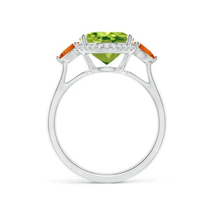 Oval peridot and trillion citrine diamond cocktail ring in 18k white gold by Irdoja Diamonds.