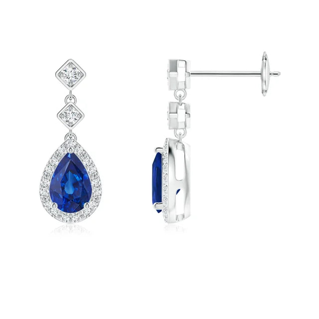Pear blue sapphire drop earrings with diamond halo, set in 18K and 14K gold by Irdoja Diamonds.