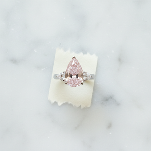 4.66ct Pear-Cut Fancy Vivid Pink Diamond Halo Ring VS1