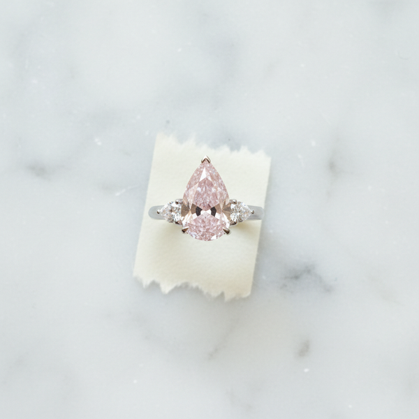 4.66ct Pear-Cut Fancy Vivid Pink Diamond Halo Ring VS1