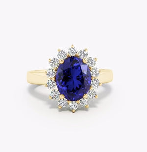 Lab-Grown Princess Diana Inspired Blue Sapphire Ring with Diamond Halo showcasing an oval blue sapphire and diamond halo.