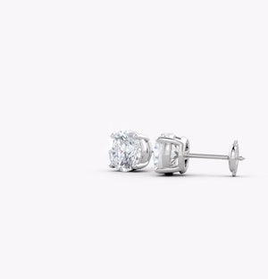 Lab-Grown Diamond Stud Earrings showcasing round brilliant diamonds in white gold settings.