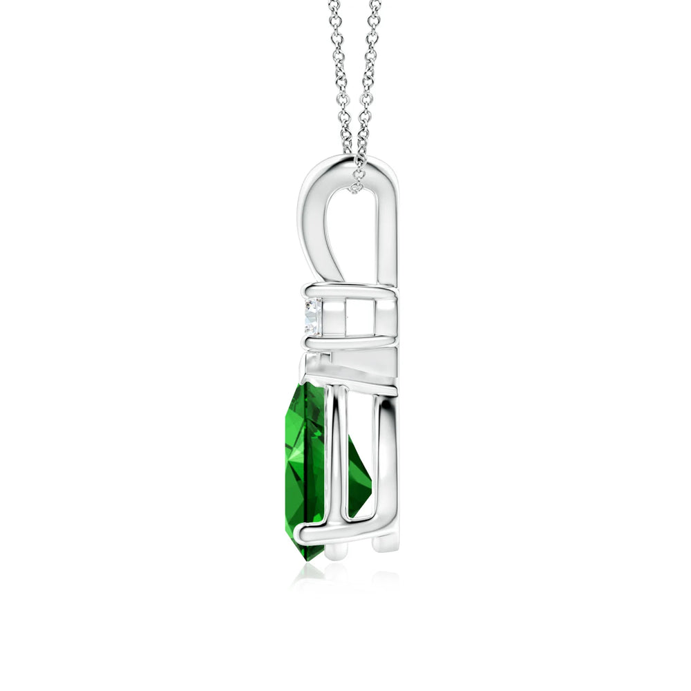 Prong-Set Lab-Grown Emerald Teardrop V-Bale Pendant with Diamond showcased in a beautiful design, featuring a vibrant emerald and diamond accent.