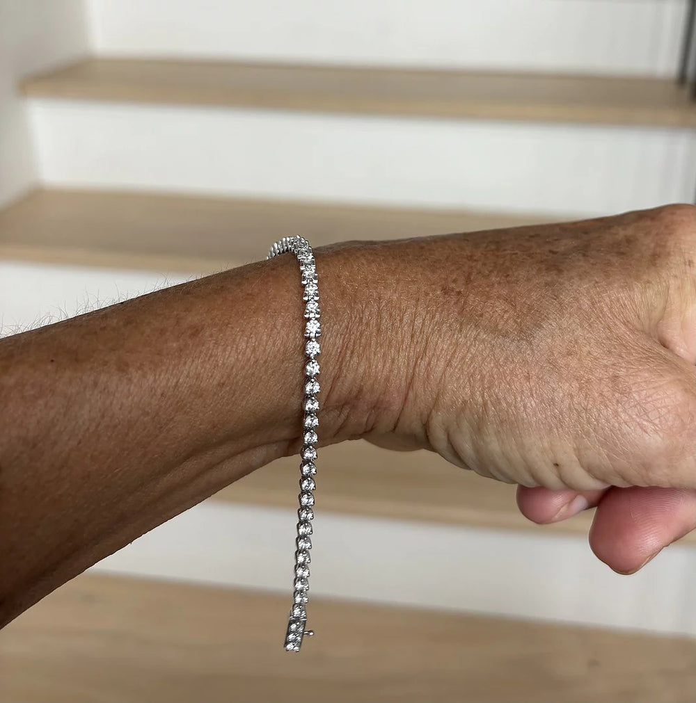 Prong-Set Round Lab-Grown Diamond Tennis Bracelet featuring round brilliant diamonds in a delicate prong setting.